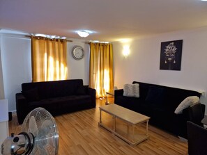 Apartment, 1 Schlafzimmer, barrierefrei | Wohnzimmer