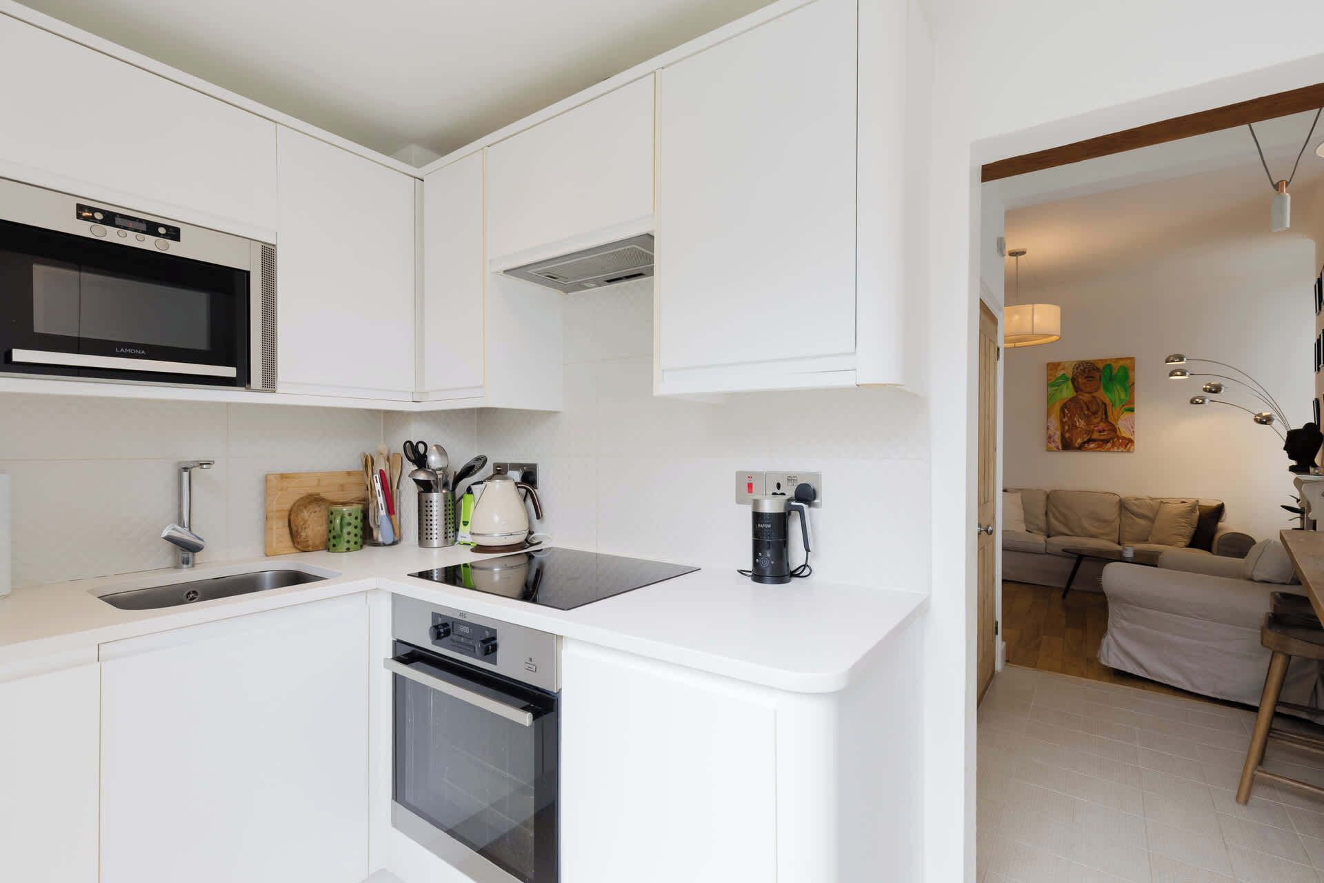 Coffee/tea maker, fridge, microwave, oven