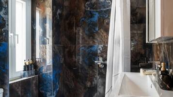 Shower, hair dryer, towels