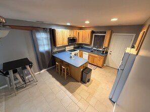 Microwave, oven, stovetop - Elevated Shore Getaway- Cozy 2-bedroom, pet friendly house in Wildwood! (Wildwood)