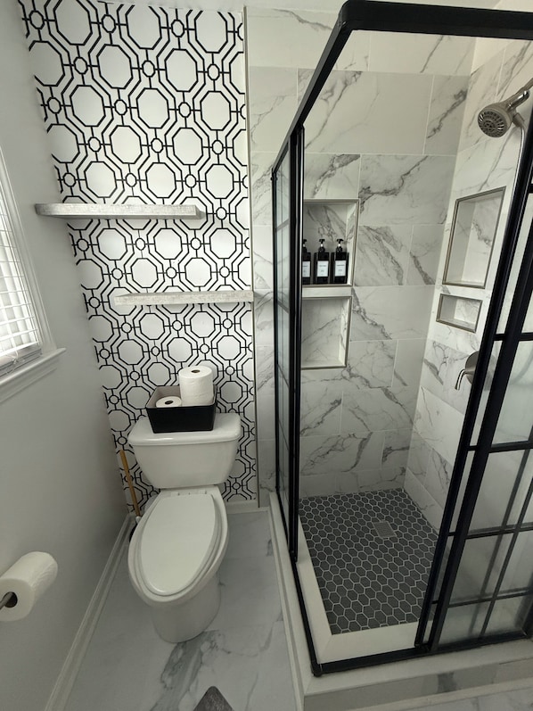 Shower, towels, soap - Elevated Shore Getaway- Cozy 2-bedroom, pet friendly house in Wildwood! (Wildwood)