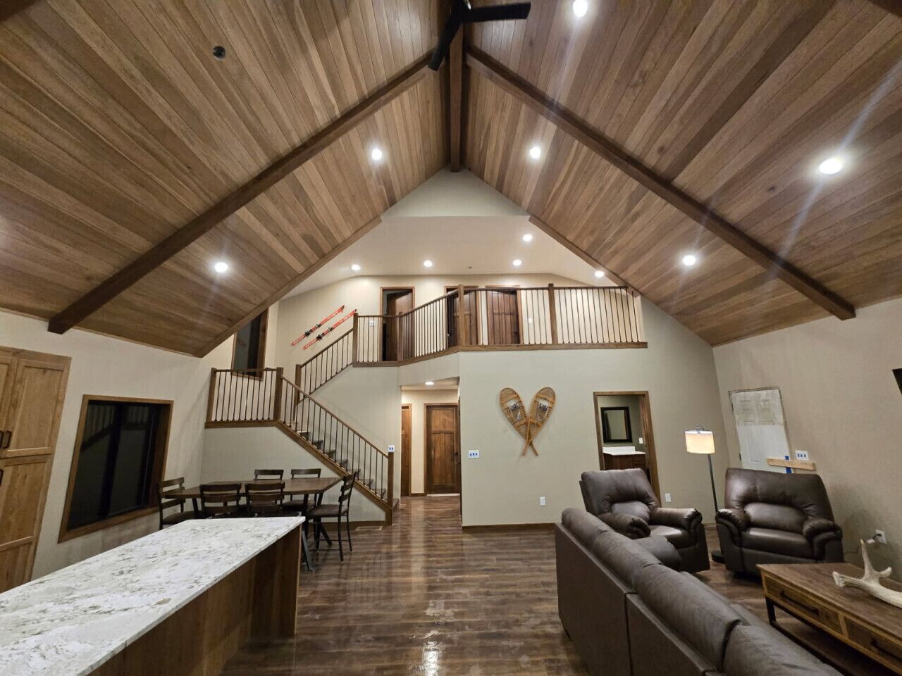 Enter your cabin to an incredible display of vaulted ceilings, recessed lighting, & grand features in every direction