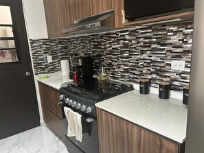 Fridge, microwave, oven, stovetop - Modern Playa Condo, Pools, Gym & Near Beach (Playa del Carmen)