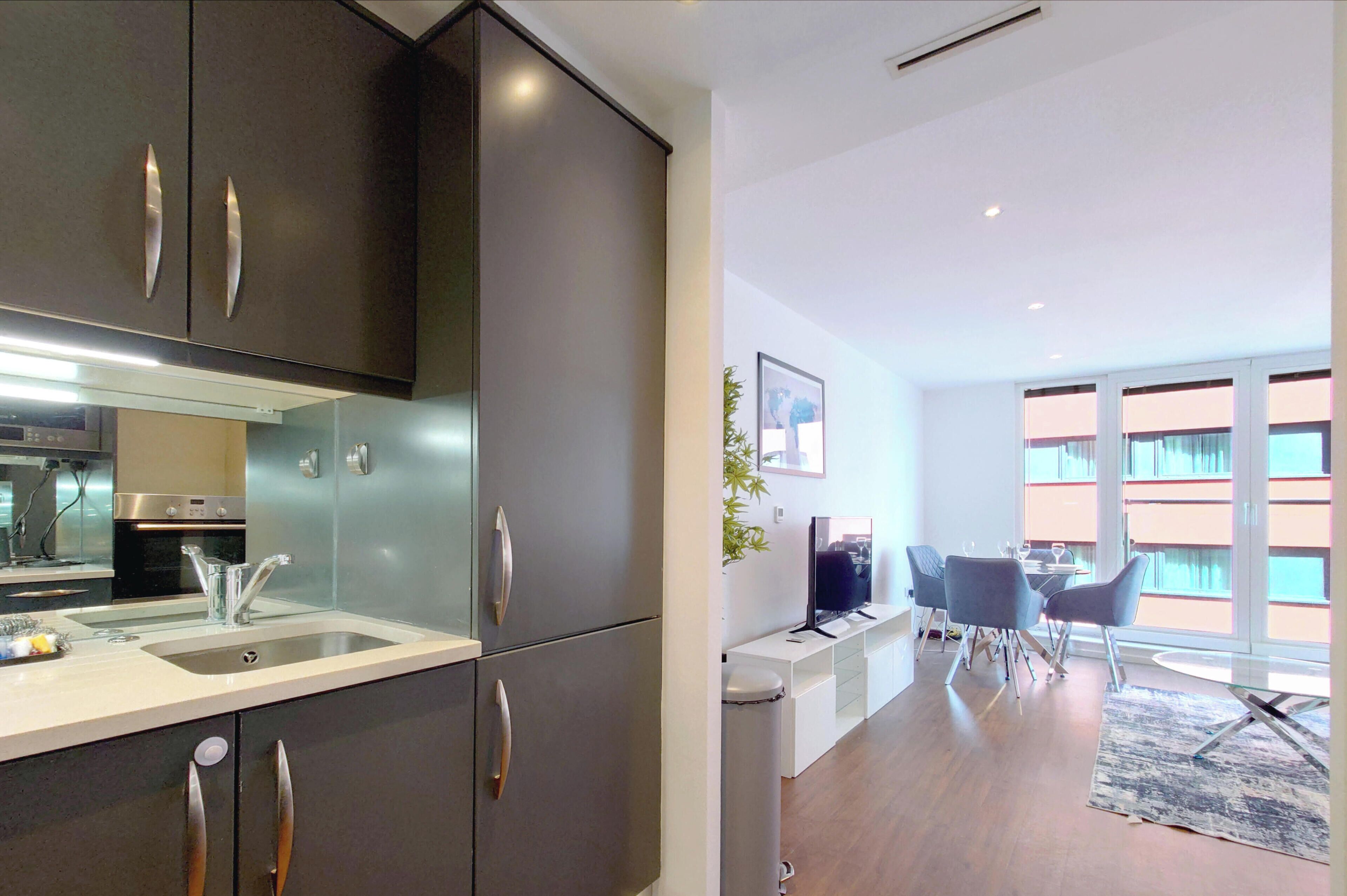 Departamento Deluxe, 1 habitación (by London Excel & O2) | Cocina privada | Cafetera y tetera, horno, parrilla de estufa y lavavajillas 