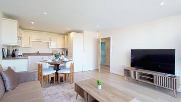 Classic Apartment | Living area | 50-inch Smart TV with digital channels, Netflix, streaming services