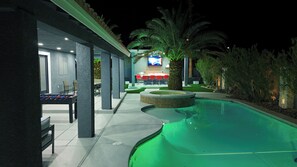 Outdoor pool, a heated pool - Luxurious 6-Bedroom House In Las Vegas with Pool And Spa - EV Charger (Las Vegas)
