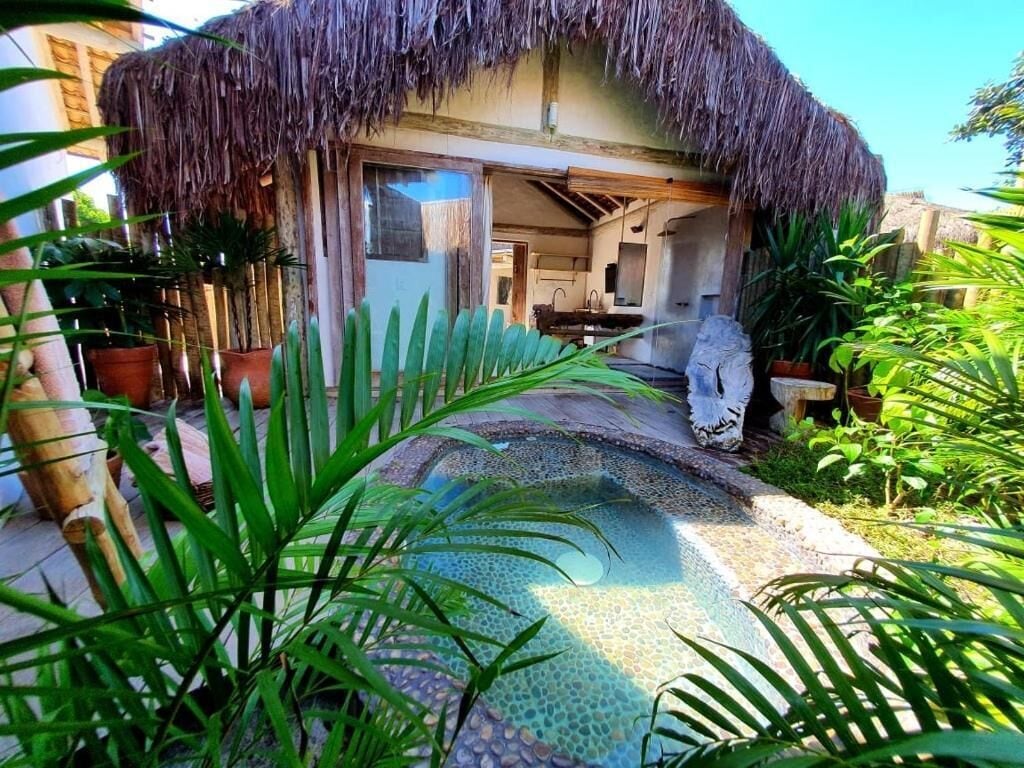 Quarto casal superluxo, vista para o pátio | Área da propriedade