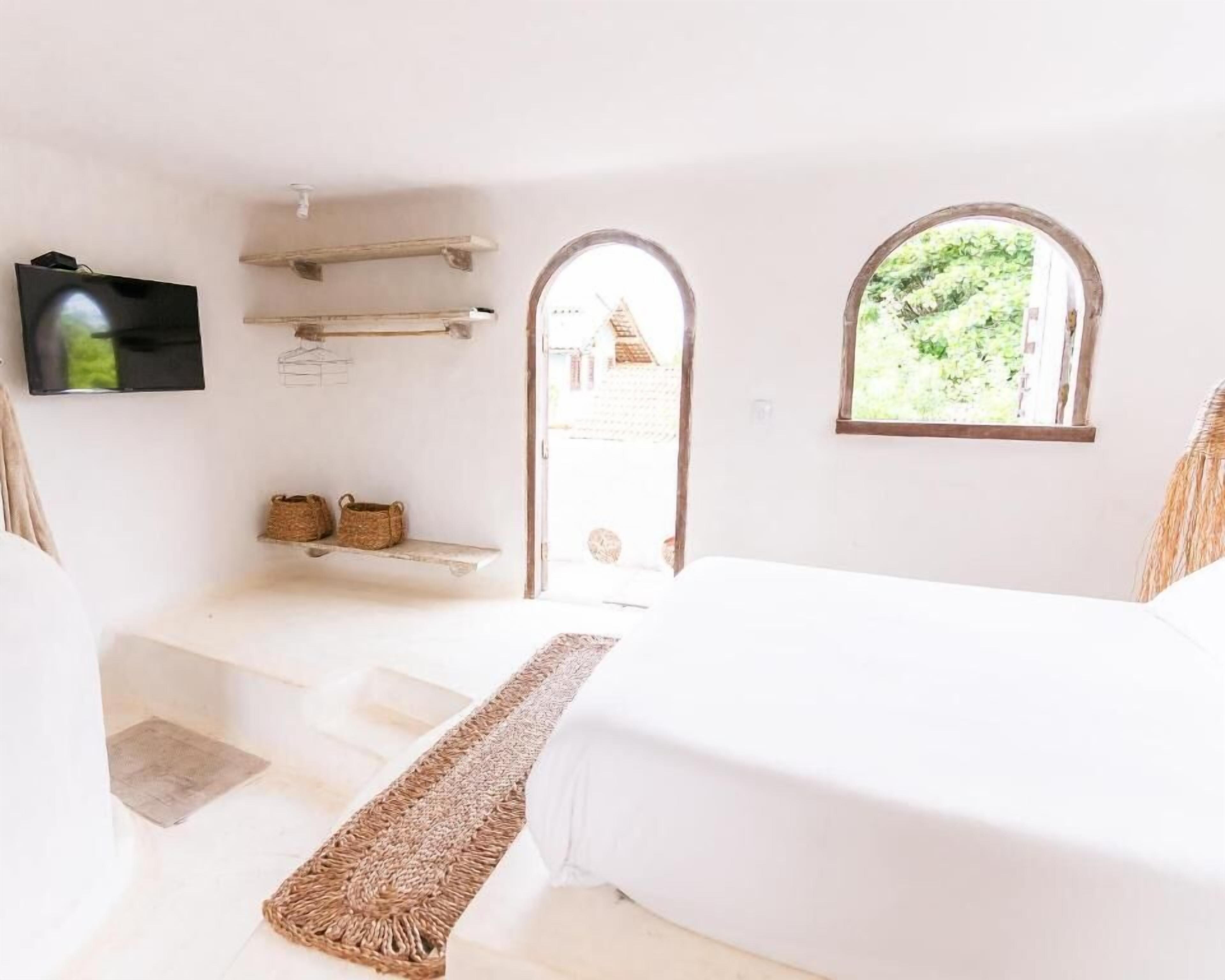 Habitación triple de lujo, vistas al patio