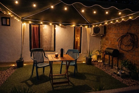 Outdoor dining. Alvear Home