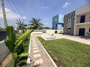 Property grounds - Nhyira Villas: Beautiful Brand New 2-Bedroom/ 2.5 Bath Apartment in Adenta w/ AC (Adenta)