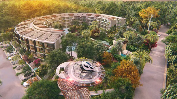 A modern hotel with a circular design, surrounded by lush greenery and a parking area. - Jungle Vibes Studio in Tulum / Private (Tulum)