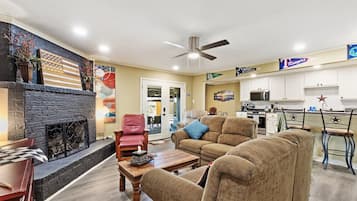 Smart TV, fireplace, books