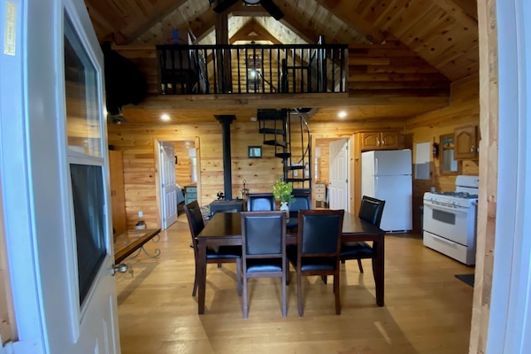 front door and dinning room