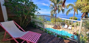 Property grounds - Appartement Le Bel avec terrasse, incredible sea view and pool space (Petite Île)