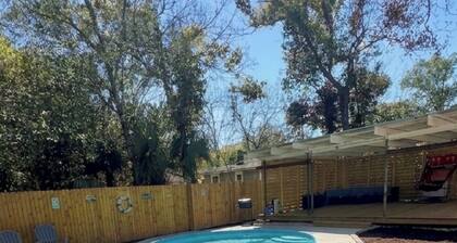 Family Friendly River City Getaway - 2BR with Pool + Spacious Deck, Sleeps 9!