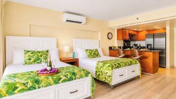 Condo (1 Bedroom) | Laptop workspace, iron/ironing board, free cribs/infant beds, bed sheets