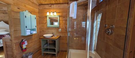 Shower, jetted bath, towels