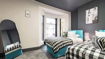 4 slaapkamers, een strijkplank/strijkijzer, gratis wifi, beddengoed