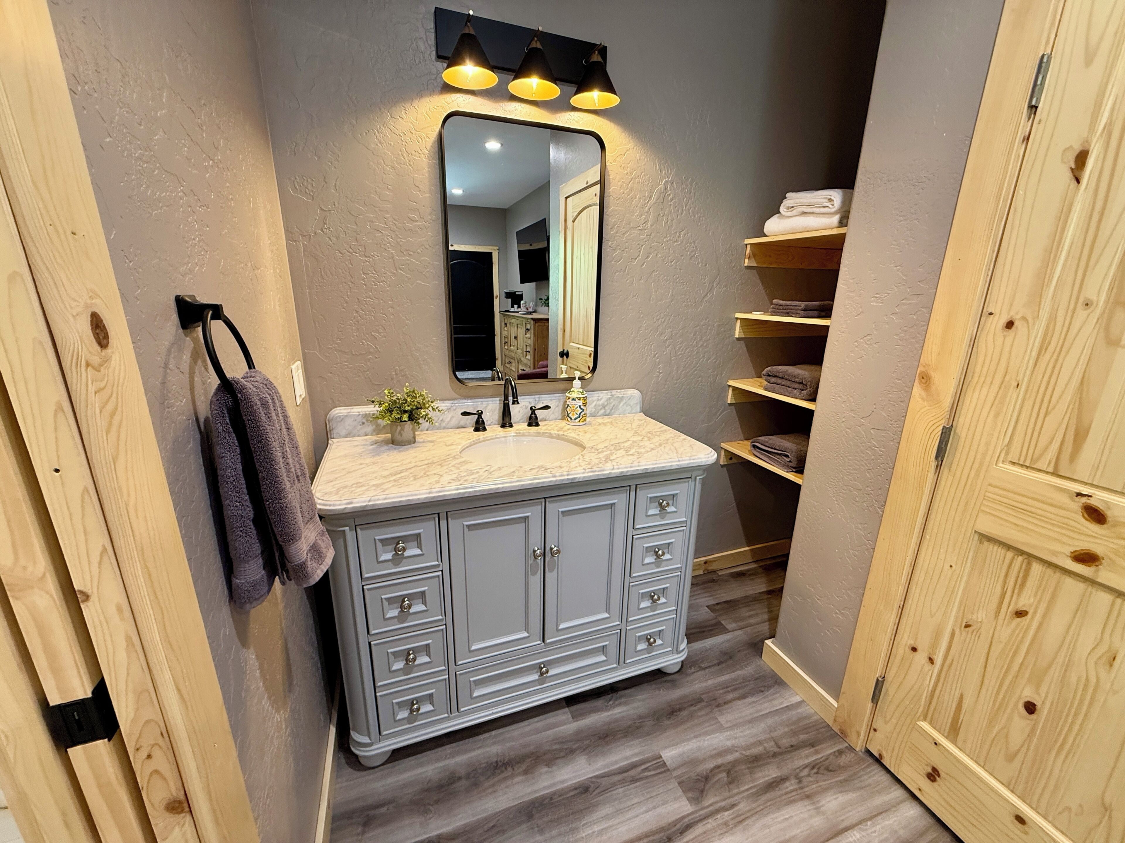 Shower, towels, soap, toilet paper