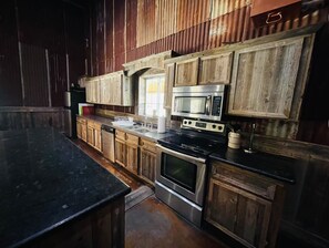 Private kitchen - Leaning Bluff Lodge at Barefoot Fishing Camp on the Colorado River in Bend. (Bend)