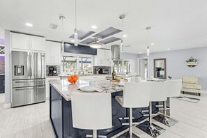 Fridge, microwave, oven, stovetop - 2 Waterfront Villas, Dual Pools, Gulf Access & Tiki Hut Escape - Everlasting Paradise - Roelens (Cape Coral)