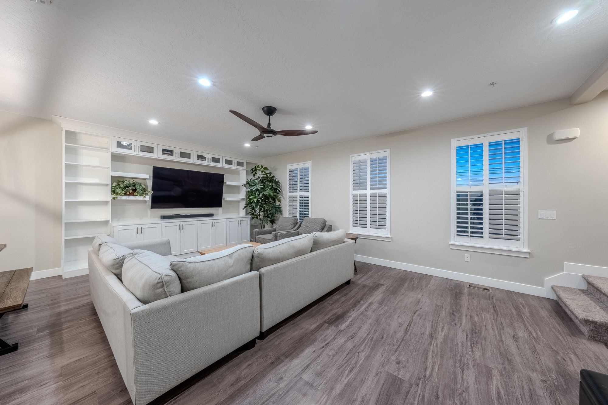 Loft with a sofa and TV built-ins