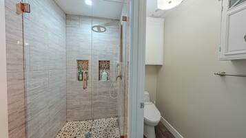 Bathroom with a walk-in tiled shower