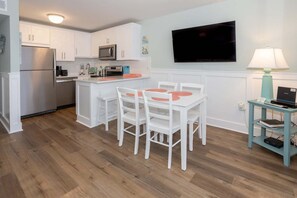 Dining - Experience oceanfront bliss in this charming 1-bedroom condo at Carolina Beach. (Carolina Beach)