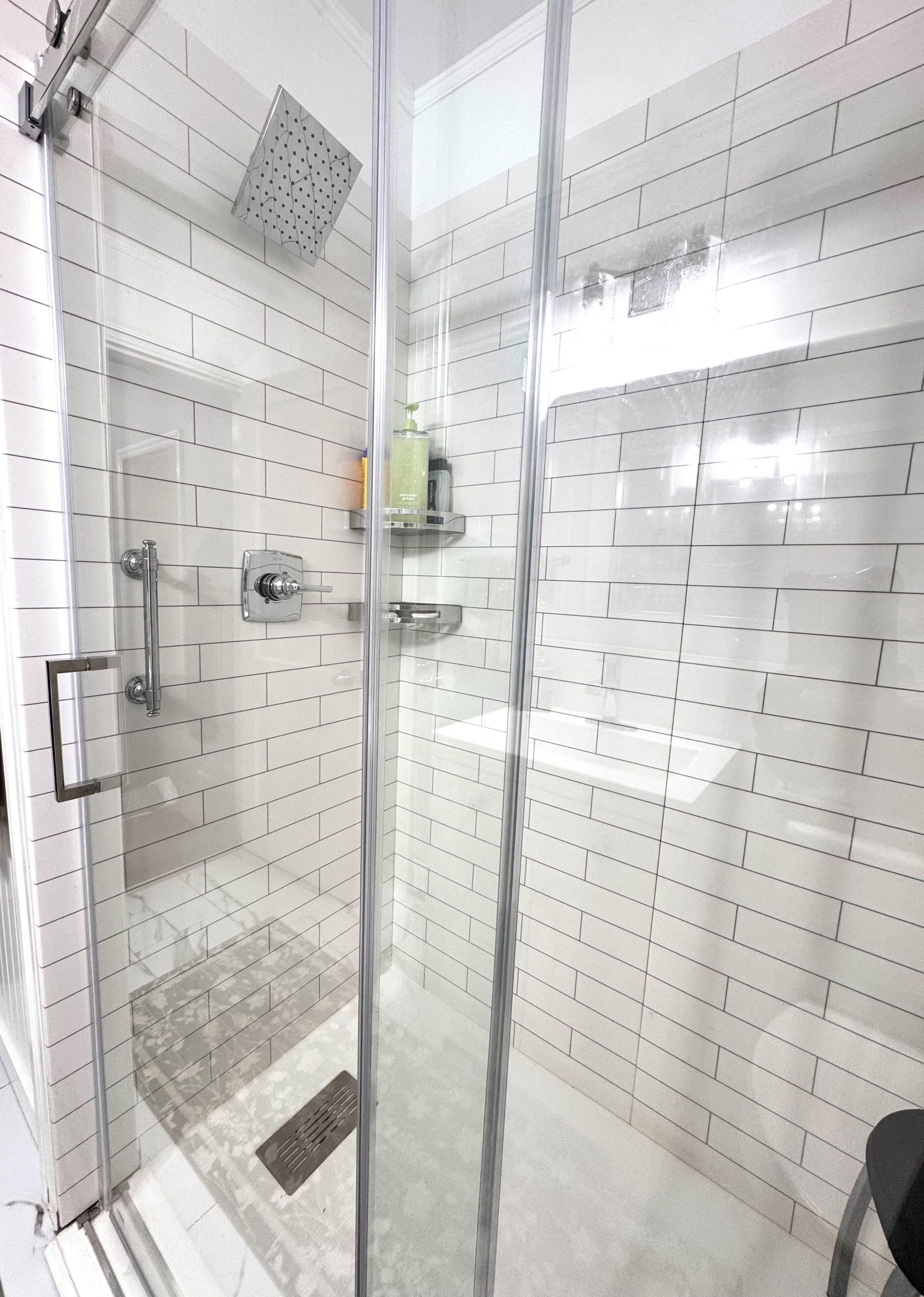 Shower, towels, soap, toilet paper