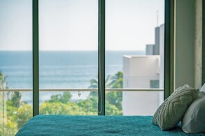2 bedrooms, iron/ironing board, travel cot, free WiFi - Ocean-view 2BR in El Zonte's Surf City with a complimentary gift included: airport transfer, surf lesson, or in-unit massage. Pool, gym, concierge & Bitcoin Beach access included. (El Zonte)