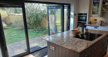 Spacious 3BR Home with Garden and Parking