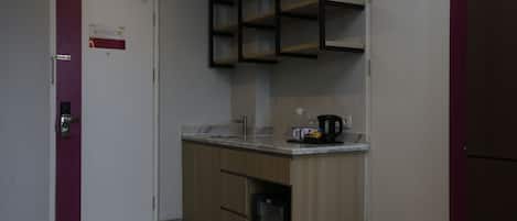Quarto (Executive Suite) | Cofres nos quartos, escrivaninha, Wi-Fi de cortesia, roupa de cama