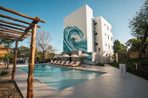 Escape to The Zonte Sol, a peaceful garden retreat in Zonset Surf Residences, where tropical, natural light, and a private terrace create the perfect setting to unwind. Accommodates up to three guests just steps from El Zonte Beach in Surf City