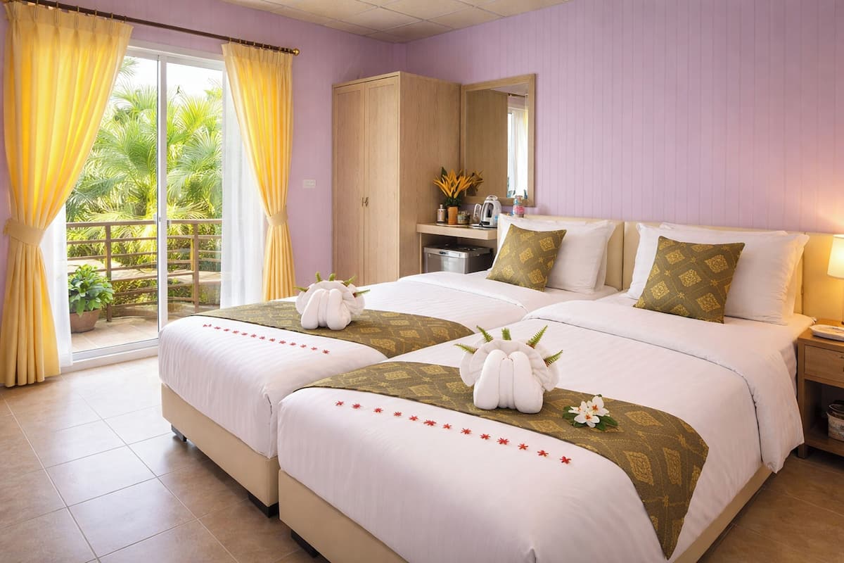 Chambre avec lits jumeaux, vue jardin | Bureau, Wi-Fi gratuit, draps fournis