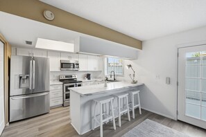 Imagen sin descripción, 5 de 15, botón