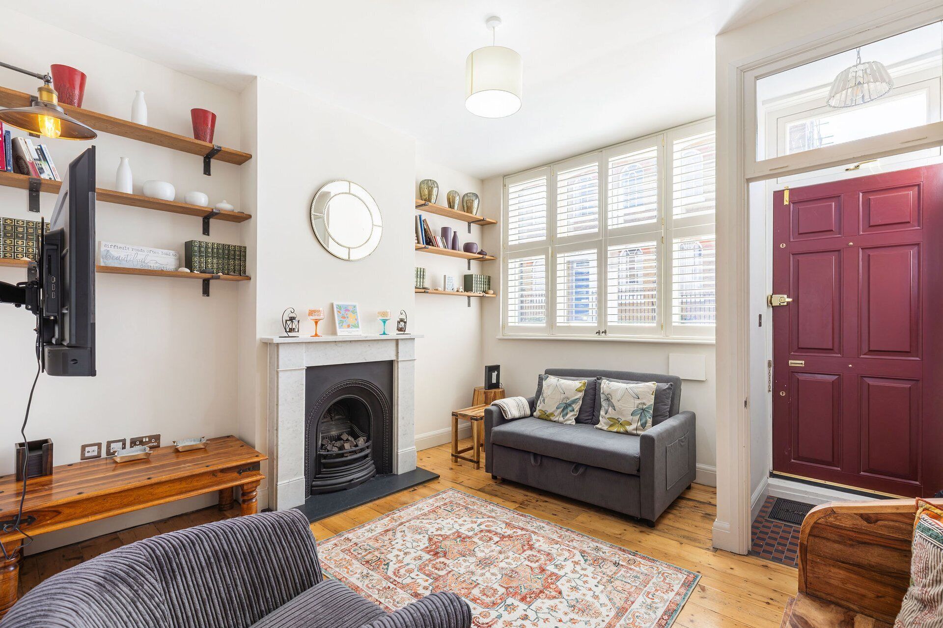 TV, fireplace, books