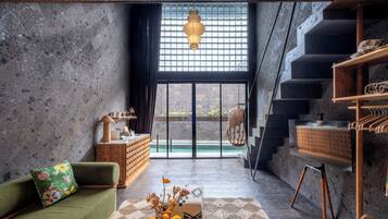 Deluxe Suite, 1 Bedroom, Pool View | Ruang tamu