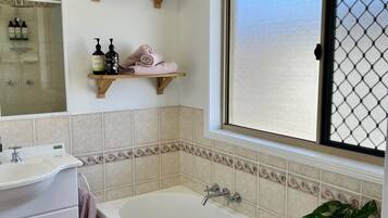 Shower, hair dryer, towels, soap