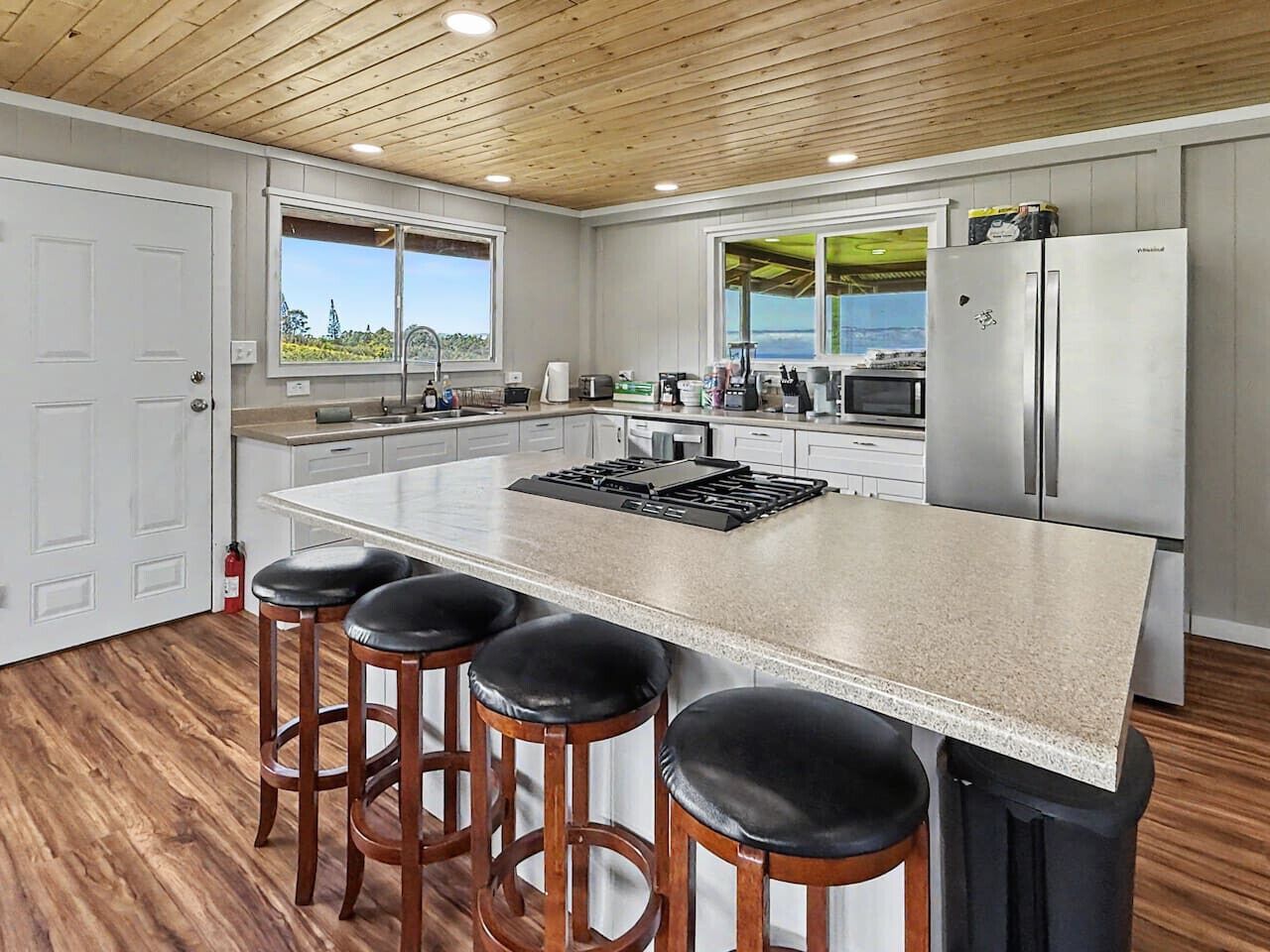 Microwave, coffee/tea maker, dining tables