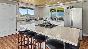 Microwave, coffee/tea maker, dining tables
