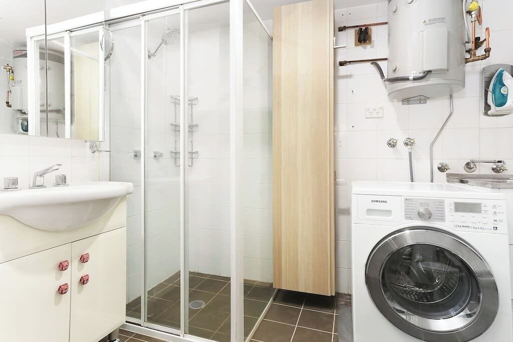 Shower, hair dryer, towels, shampoo
