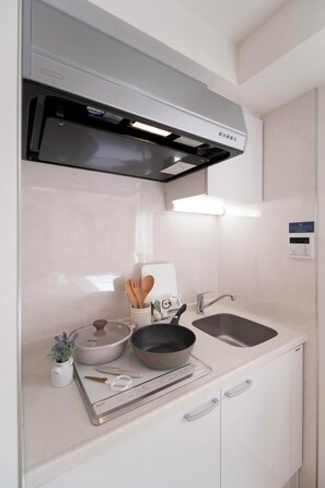 Basic Apartment, City View | Private kitchen | Full-size fridge, microwave, stovetop, cookware/dishes/utensils - WINSUN Shinsaibashi (Osaka)