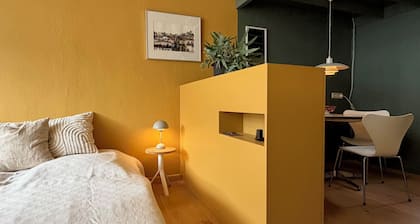 Guest room for 2 people in a former village school with sculptor's studio.