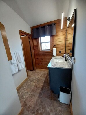 Jetted tub, hair dryer, towels, toilet paper