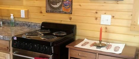 Coffee/tea maker, fridge, oven, stovetop