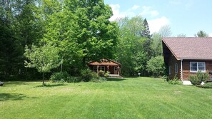 Exterior - Charming Cabin Rental with Private Front Deck near Bangor, Maine (Exeter)