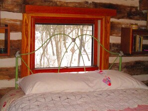 1 bedroom, desk, bed sheets - Rustic Norwegian-Style Log Cabin Rental near the Upper Iowa River in Decorah, Iowa (Decorah)