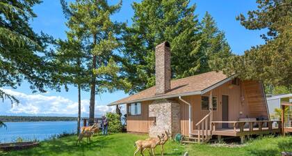 Incredible Sunset at Beachfront Glamping Cabin on Private, Herron Island with Fire Pit and Kayaking near Olympia, Washington