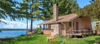 Incredible Sunset at Beachfront Glamping Cabin on Private, Herron Island with Fire Pit and Kayaking near Olympia, Washington