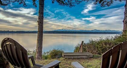 Incredible Sunset at Beachfront Glamping Cabin on Private, Herron Island with Fire Pit and Kayaking near Olympia, Washington